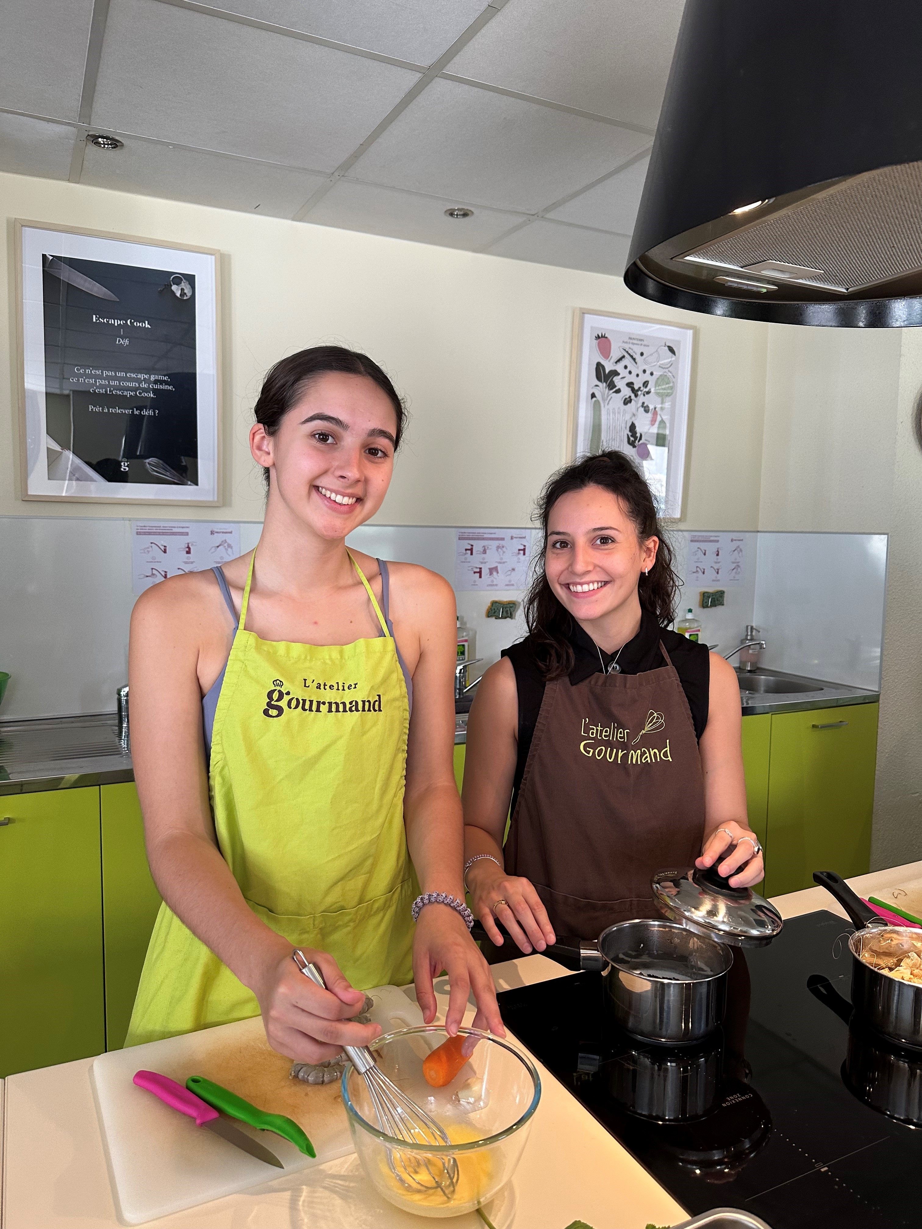 Third-year Biochemistry major Kaya McClincy and third-year Chemical Engineering major Madeline "Maddie" &nbsp;Murdock put the finishing touches on their entrée.